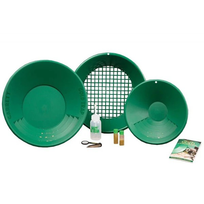 Set of green gold pans with accessories on a white background