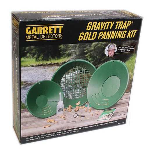 Garrett Gravity Trap Gold Panning Kit packaging with green pans and accessories on a wooden surface.
