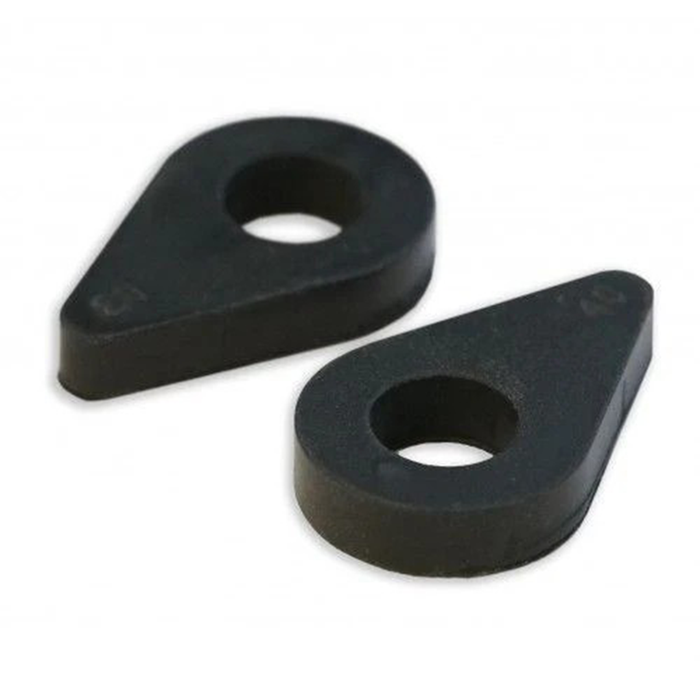 Two black rubber washers on a white background