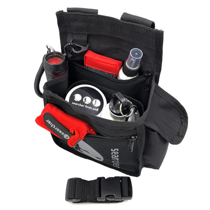 Black waist bag with various items including a red tool and a white bottle on a white background