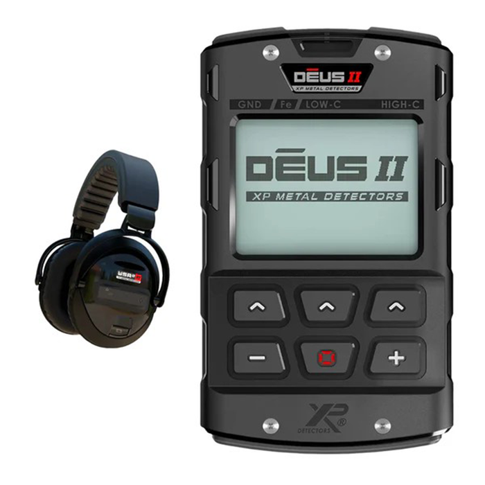 Metal detector with headphones on a white background